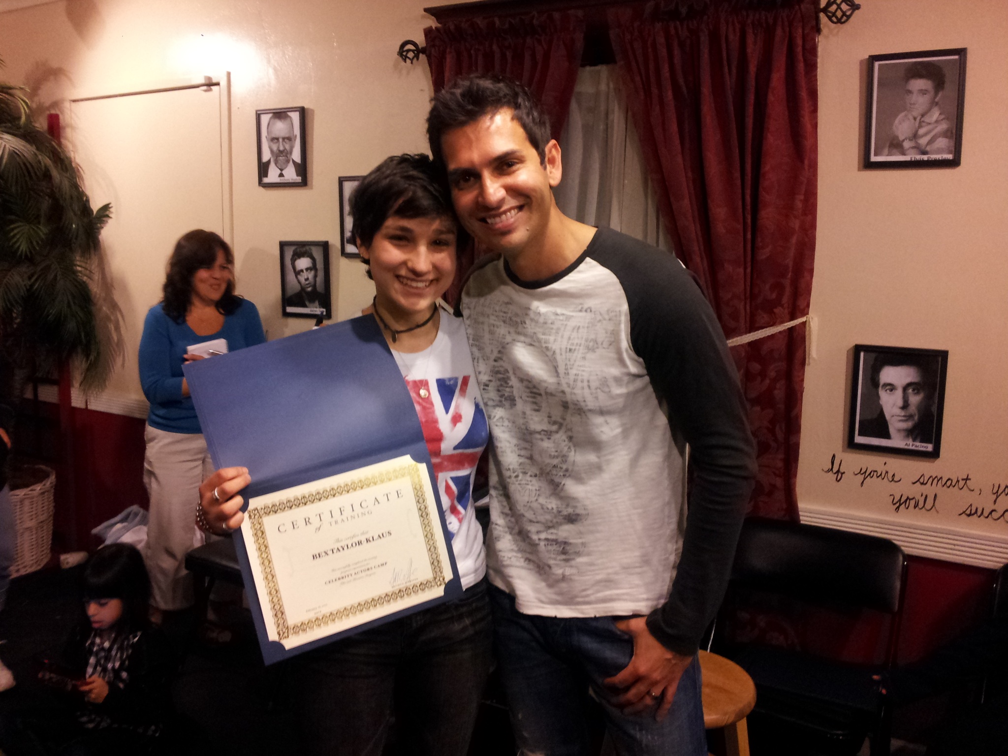 Photo of Bex Taylor-Klaus graduating Adrian's R'Mante's acting program. He discovered her in Atlanta and now she is living the dream!