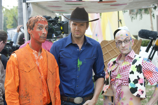 Still of Joel McHale, Jim Rash, Danny Pudi and Dean Pelton in Community (2009)