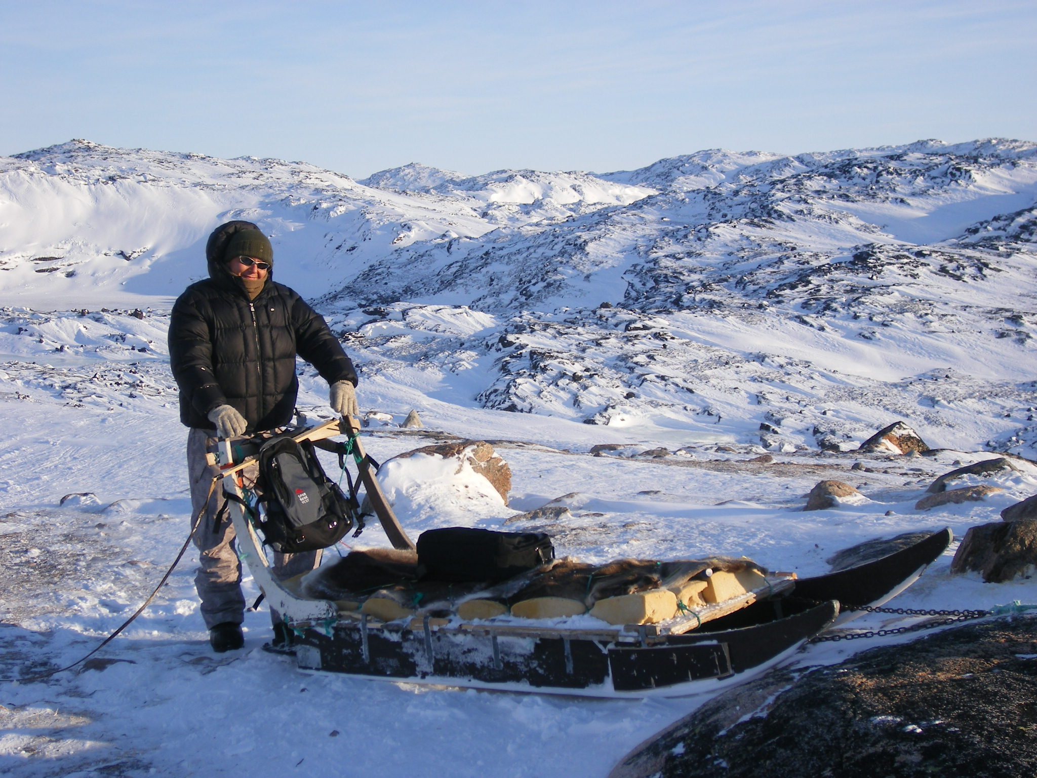 On dog sled while shooting in Greenland