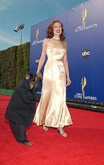 Jonas, the Professional Stunt Monkey and star of Planet of the Apes, escorts Laurie Reeves down the red carpet at the 2004 World Stunt Awards