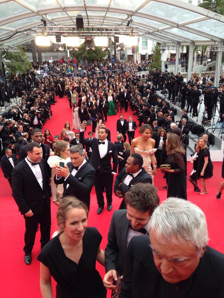 Cisco Reyes taking a Selfie on the Red Carpet of the 2014 Cannes Film Festival