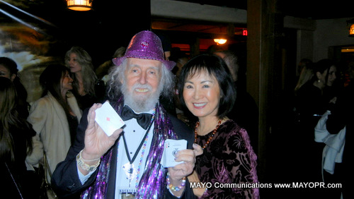 Alexis Rhee at a breast cancer awareness event with a Magician, 2011.