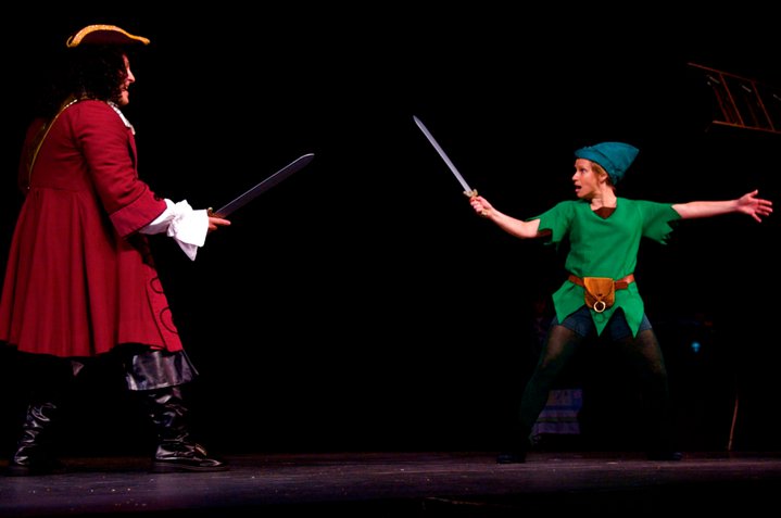 Roger Rignack as Captain Hook dueling Peter Pan.