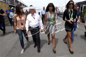Nichole Galicia with Bernie Ecclestone and his wife Fabiana walking the Formula 1 grid in Montreal.