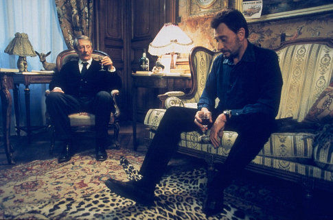 Still of Johnny Hallyday and Jean Rochefort in L'homme du train (2002)