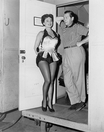 Milton Berle with Ruth Roman backstage of 'Always Leave Them Laughing,