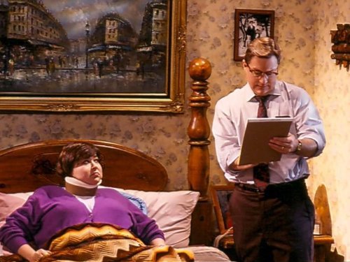Still of Roseanne Barr and Stephen Root in Roseanne (1988)