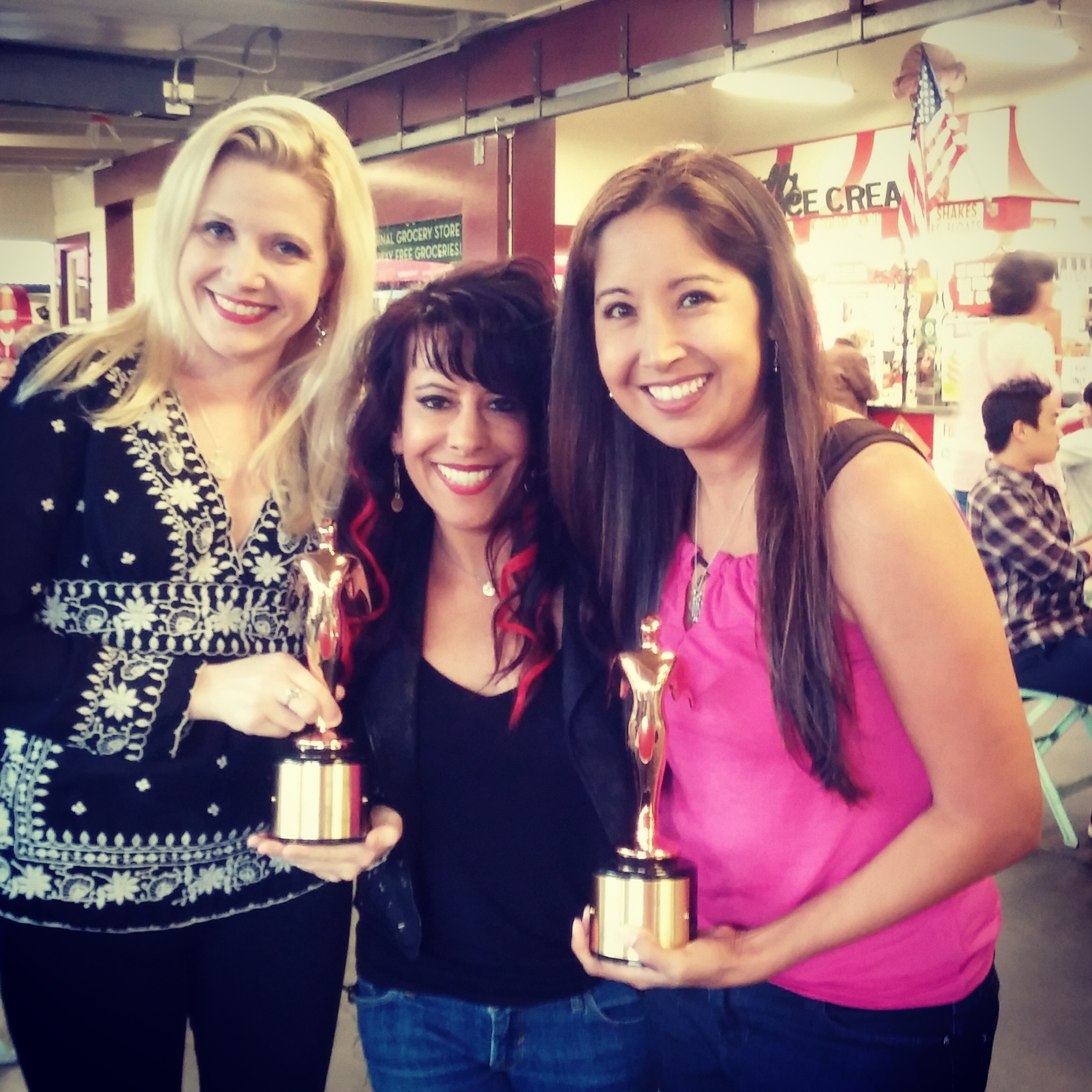 Misty's music video, Panic Button, is a 2 time Telly Award winner. Pictured here with her close friends, Amanda & Stephanie. They helped her begin the journey with a pre-production meeting right at this very spot! The Farmer's Market in Hollywood.