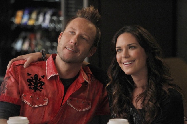 Still of Michael Rosenbaum and Odette Annable in Breaking In (2011)