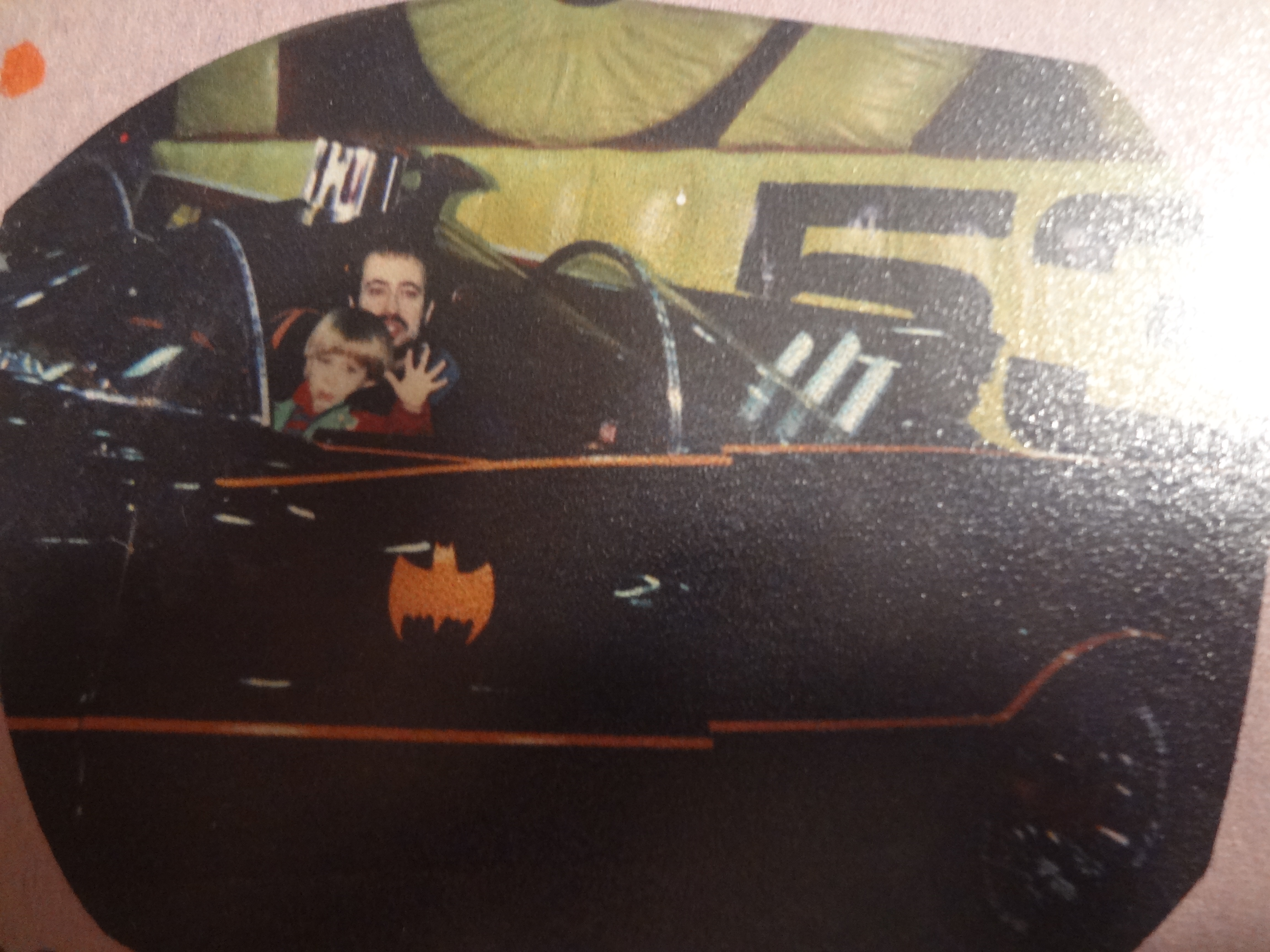 Richard Rossi & his son Joshua Rossi sitting in the Batman 66 Batmobile.