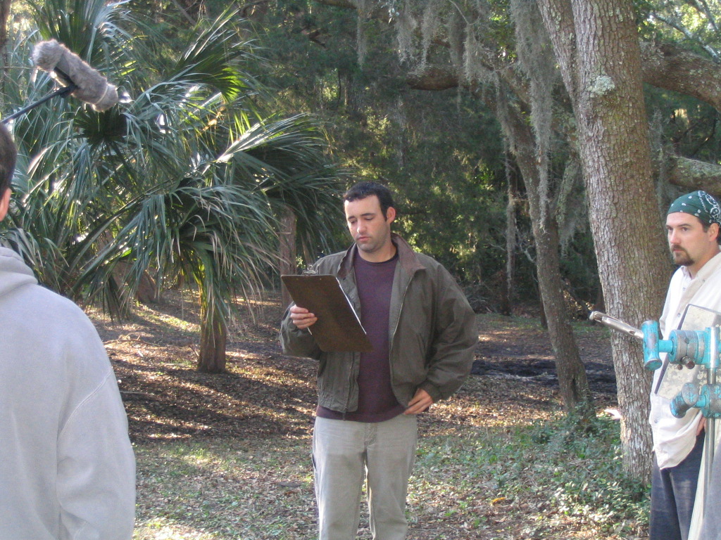 Director David Rotan reviewing a scene before shooting on 