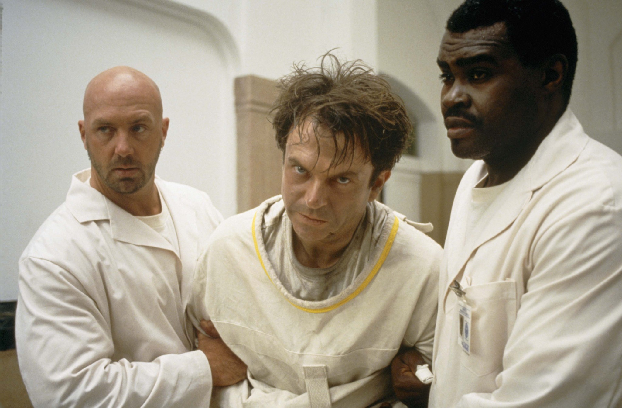Still of Sam Neill, Gene Mack and Kevin Rushton in In the Mouth of Madness (1994)