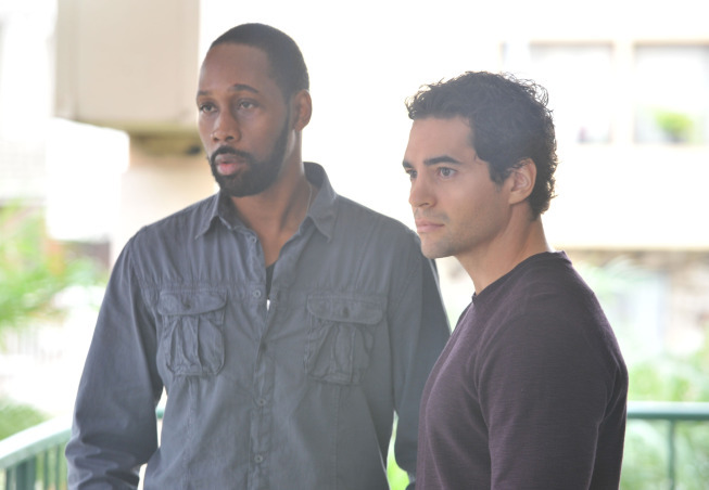 Still of RZA and Ramon Rodriguez in Gang Related (2014)