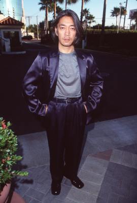 Ryûichi Sakamoto at event of Snake Eyes (1998)