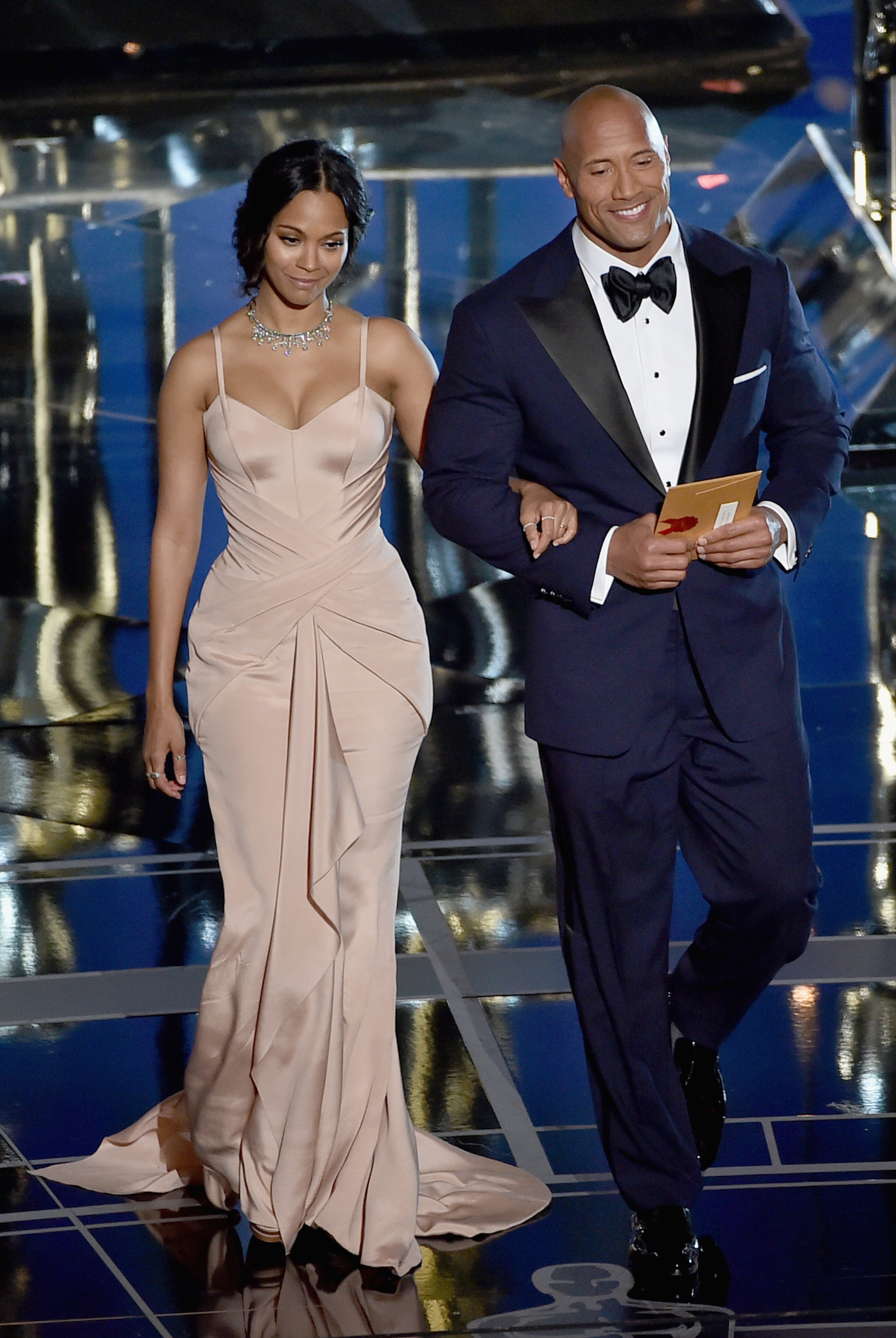Dwayne Johnson and Zoe Saldana at event of The Oscars (2015)