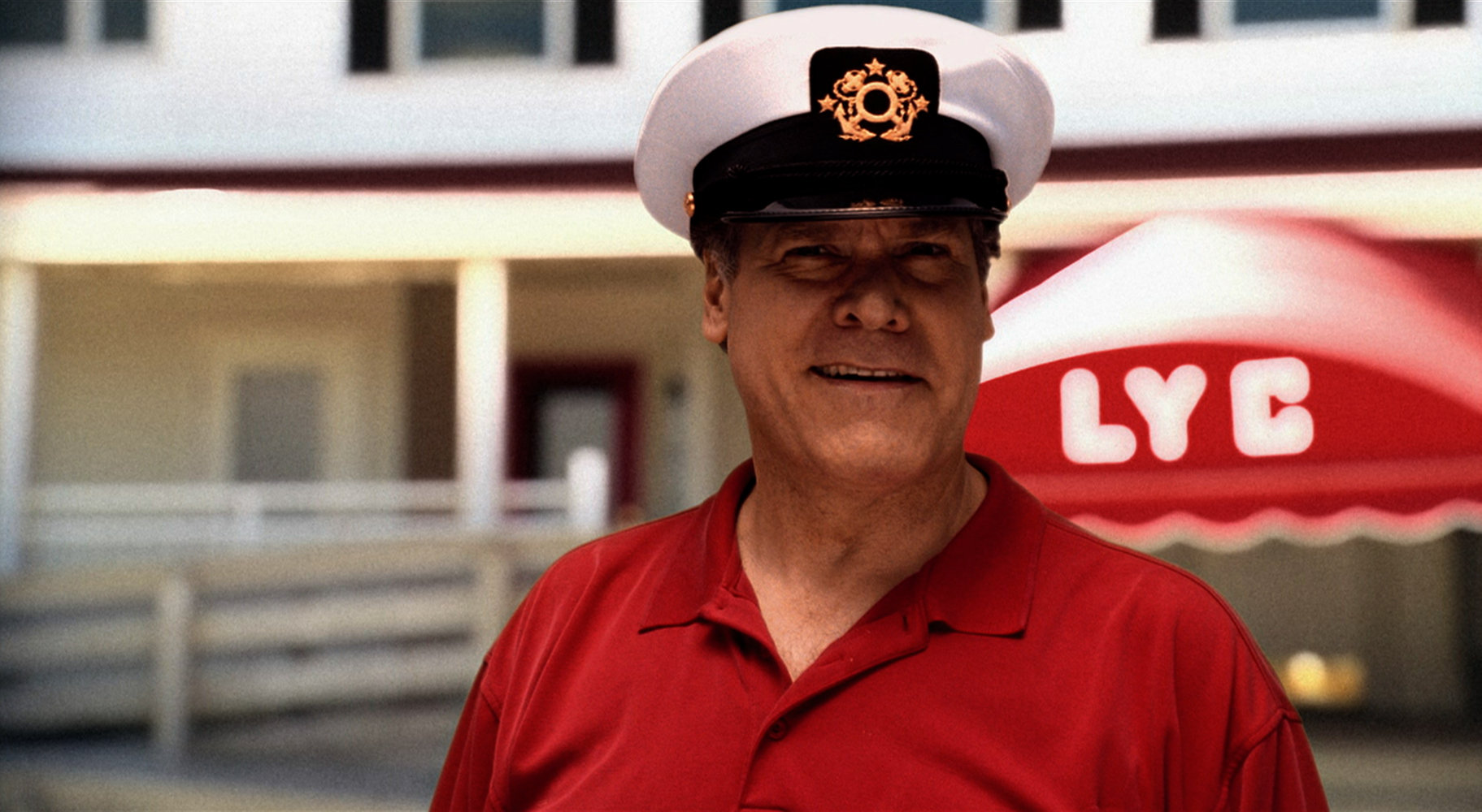 The Commodore (Jay O. Sanders) surveys the lay of the land at the Lavallette Yacht Club.