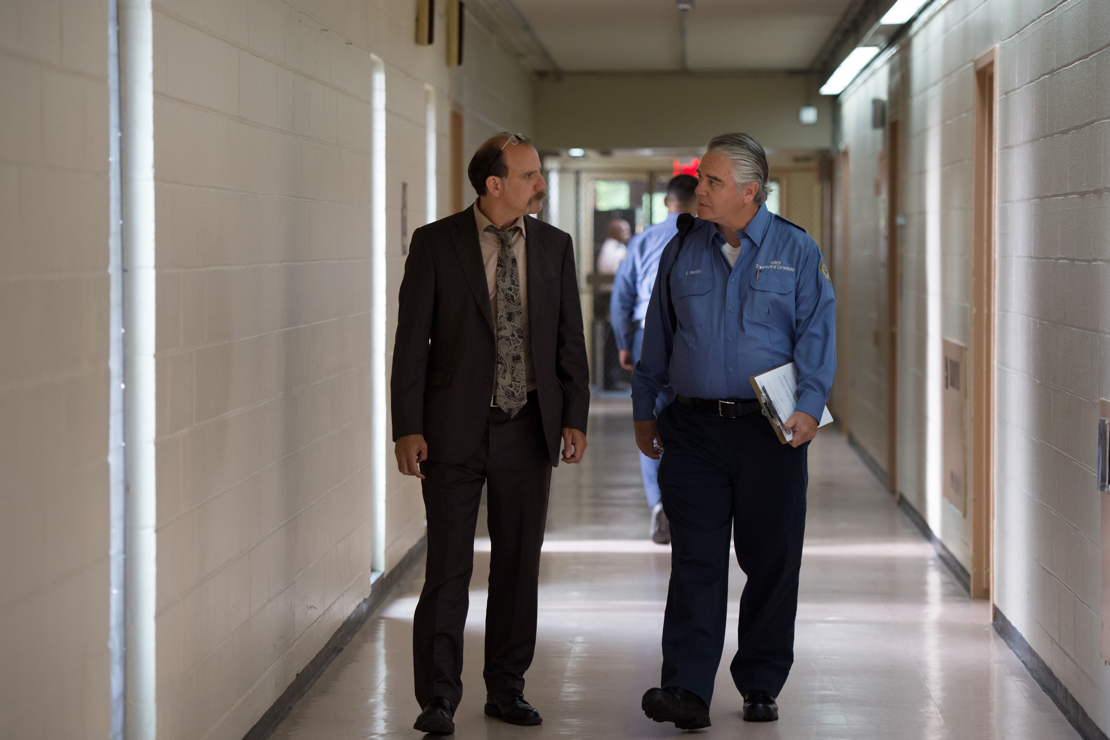 Still of Michael Harney and Nick Sandow in Orange Is the New Black (2013)
