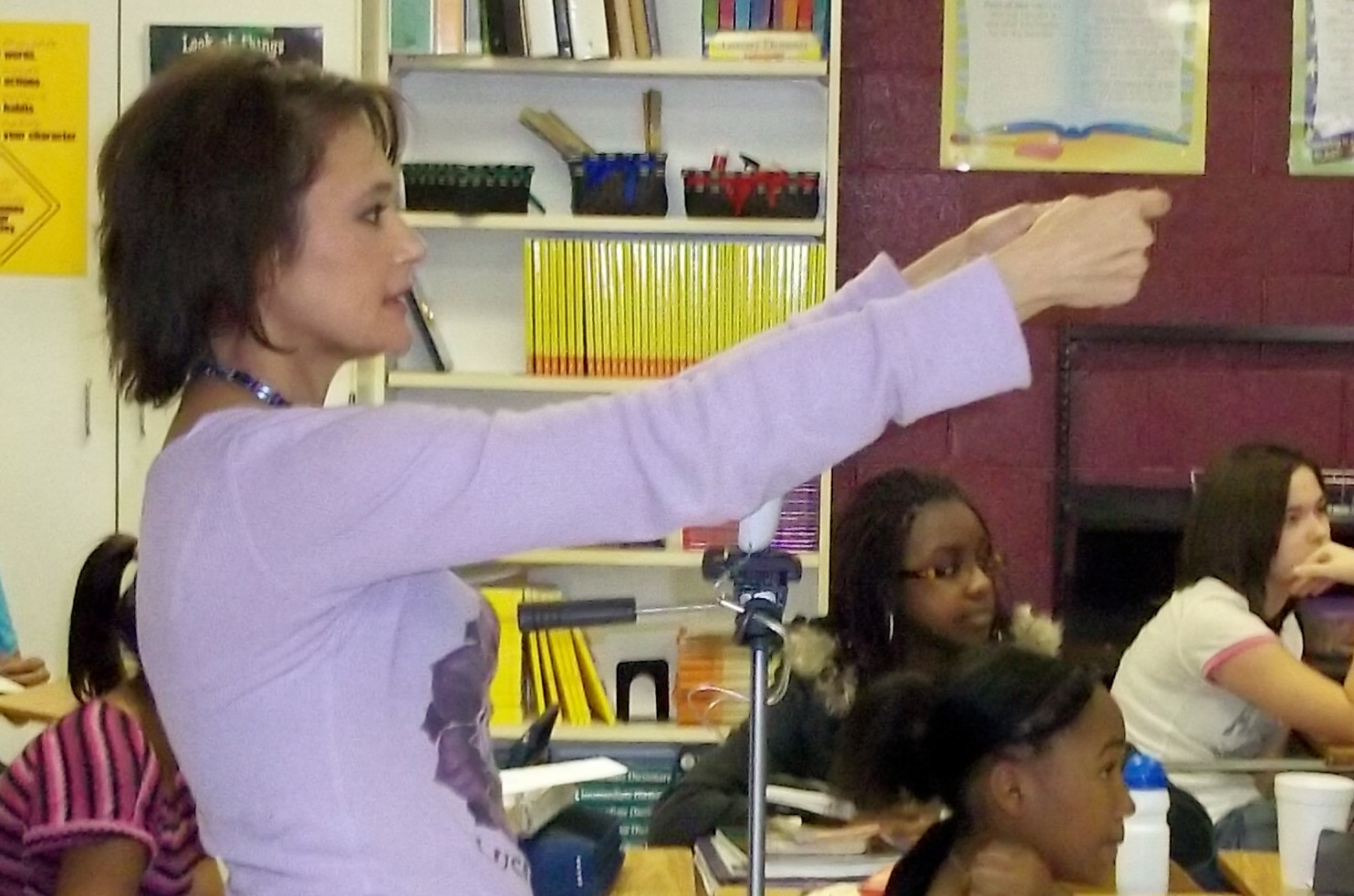 Irene Santiago teaching acting young minds at a middle school.