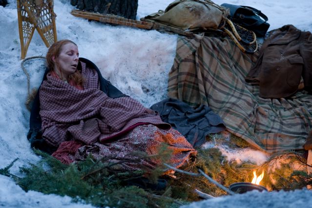 Amanda, starving and exhausted, falls asleep on watch (Michele Santopietro in THE DONNER PARTY)