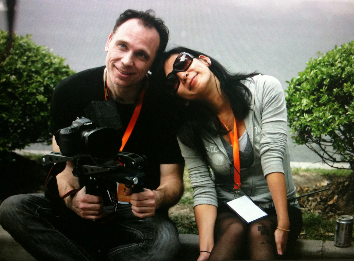 Producer Craig Santy and Producer Lillian Ng take time for a break on the set of 