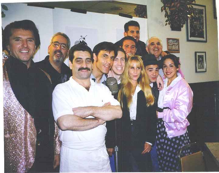 With the cast of 