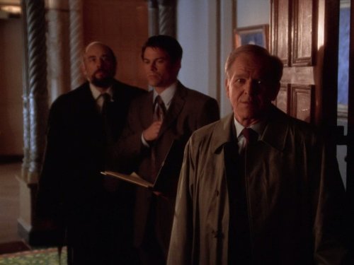 Still of Rob Lowe, Richard Schiff and John Spencer in The West Wing (1999)