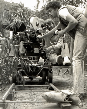 Director David Schmoeller rides the dolly on the set of TOURIST TRAP, 1978, Los Angeles.