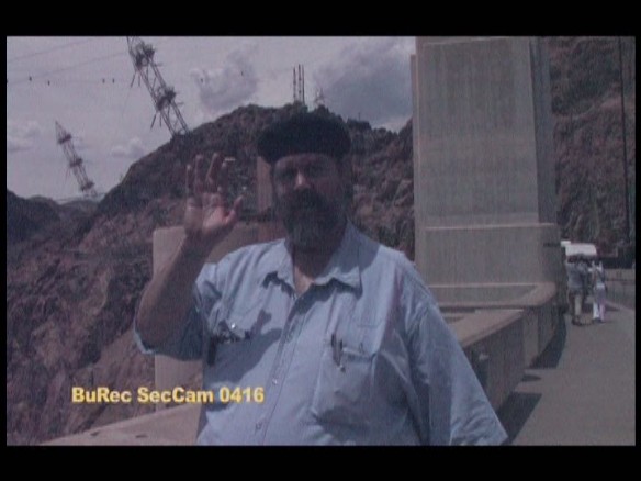 J. Neil Schulman as Ali, at Hoover Dam, in a scene from Lady Magdalene's.