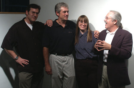 Actors Bruce Campbell and Chris Howe pose with sale rep Darlene Cypser and director Ron Teachworth during Going Back DVD Release Party September 2006