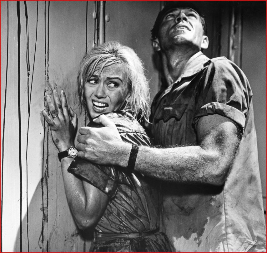 Still of Kieron Moore and Janette Scott in Crack in the World (1965)