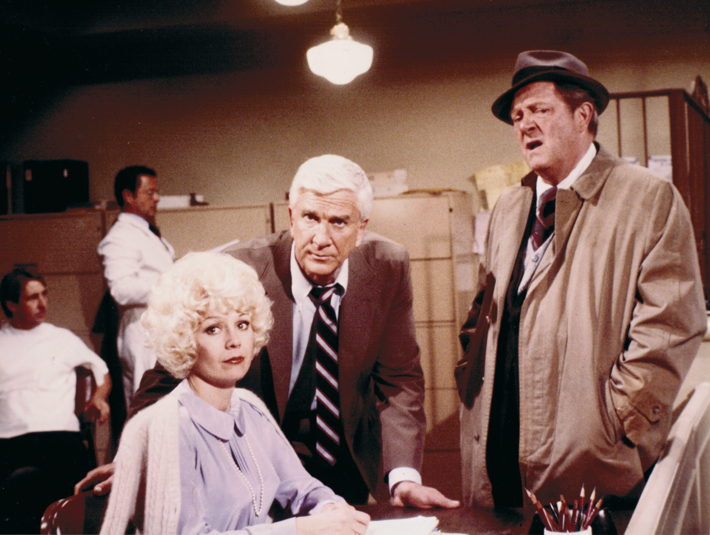 Police Squad: Kathryn Leigh Scott as Sally Decker with Leslie Nielsen and Alan North