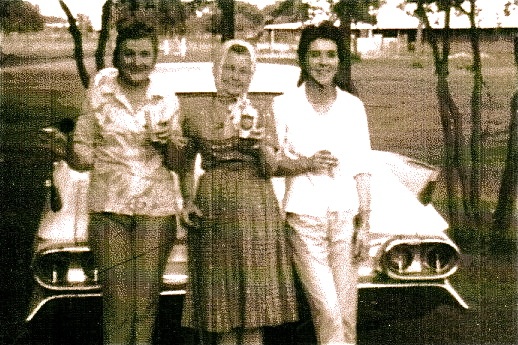 3 generations of motherhood - Wendy, my mother (r) my great-grandmother (m) Allie Mae Currie, my grandmother all leaning against 1961 Cadillac convertible