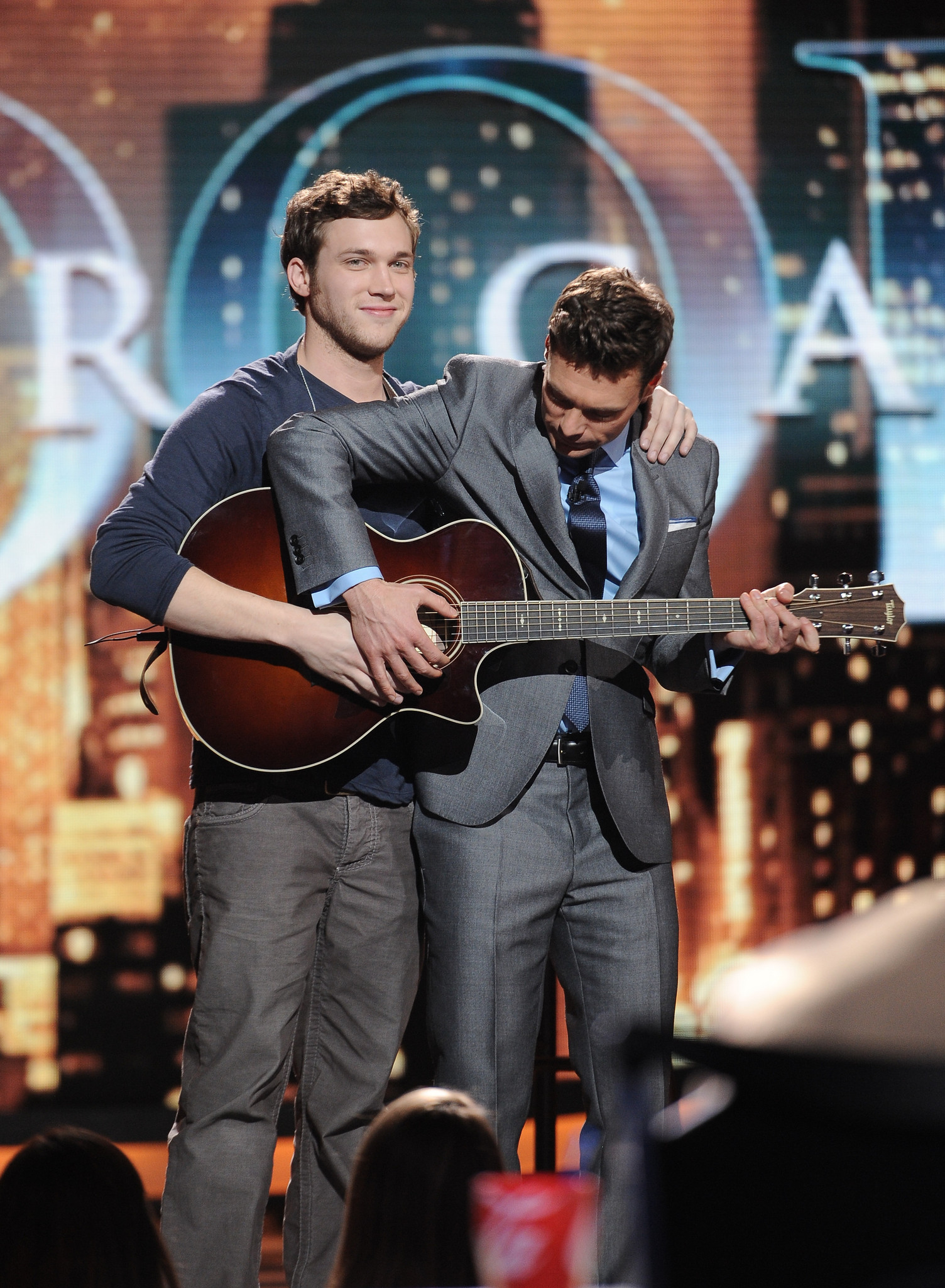 Ryan Seacrest and Phillip Phillips at event of American Idol: The Search for a Superstar (2002)