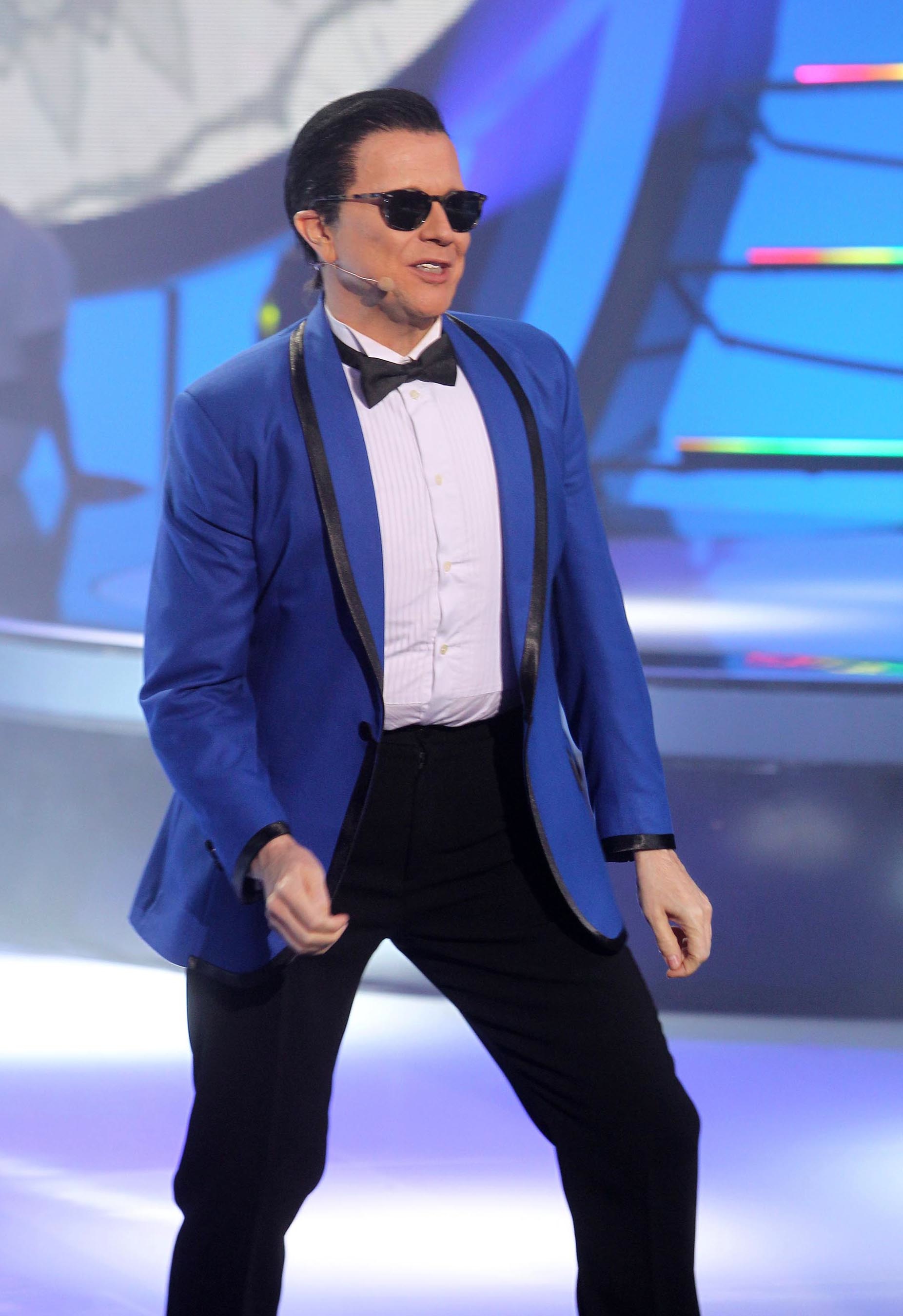 Impersonating PSY on a talent show.