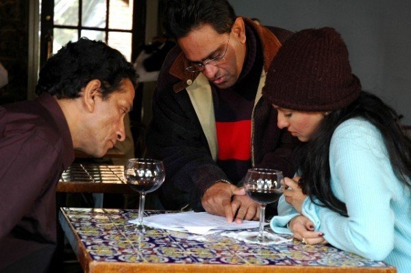 Raj Basu, Sabyasachi Chakraborty and Rituparna Sengupta in Piyalir Password (2009)