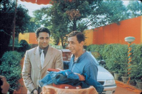 Hemant Rai (Parvin Dabas) is welcome by his father-in-law-to-be Lalit Verma (Naseeruddin Shah) at the latter's home in the Mira Nair film MONSOON WEDDING, an Odeon Films Inc. release.