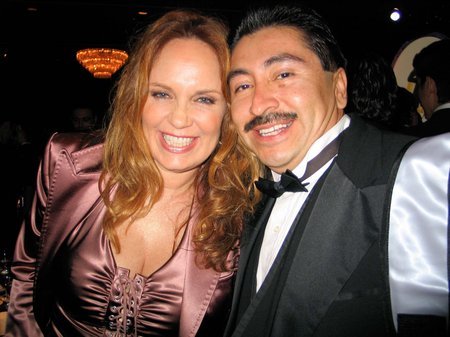 BEVERLY HILLS, CA - NOVEMBER 16 Actress Kathrine Bach and actor/photographer Alexander Sibaja pose at the Oscar De La Hoya and the Oscar De La Hoya Foundation presented 8th Annual Evening Of Champions Awards 2004 at the Beverly Hilton Hotel in Beverly Hills California.