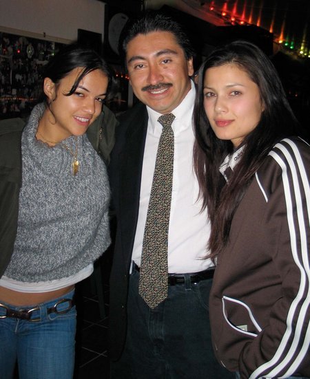 WEST HOLLYWOOD, CA - MARCH 28 Actress Michelle Rodriguez (L), actor/photographer Alexander Sibaja, and actress Natassia Malthe pose while at The Rainbow Bar & Grill on March 28, 2005 in West Hollywood, California.
