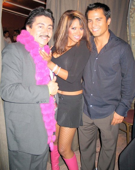 CENTURY CITY, CA - SEPTEMBER 24 Actress/master of ceremonies Traci Bingham, actor/producer/host of Upfront Entertainment Television Alexander Sibaja, and actor Jose Solano pose backstage at Venus Swimwear Finals at Century Club on September 24, 2004 in Century City, California.