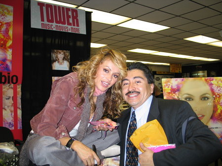 HOLLYWOOD, CA - FEBRUARY 11 Latin singer/actress Paulina Rubio & actor/photographer Alexander Sibaja at Tower Records for a signing of her new cd named 'PAULATINA' on February 11, 2004