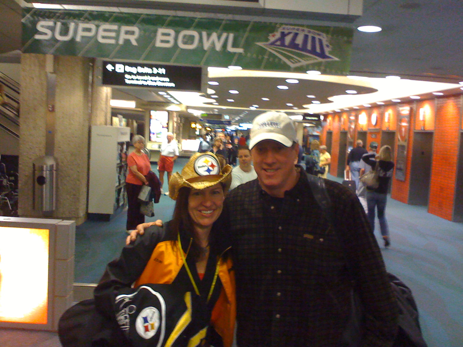 Trisha Simmons and NFL Hall of Fame Quarterback Jim Kelly on the way to cheer on the Steelers at The 43rd Super Bowl inTampa Bay.