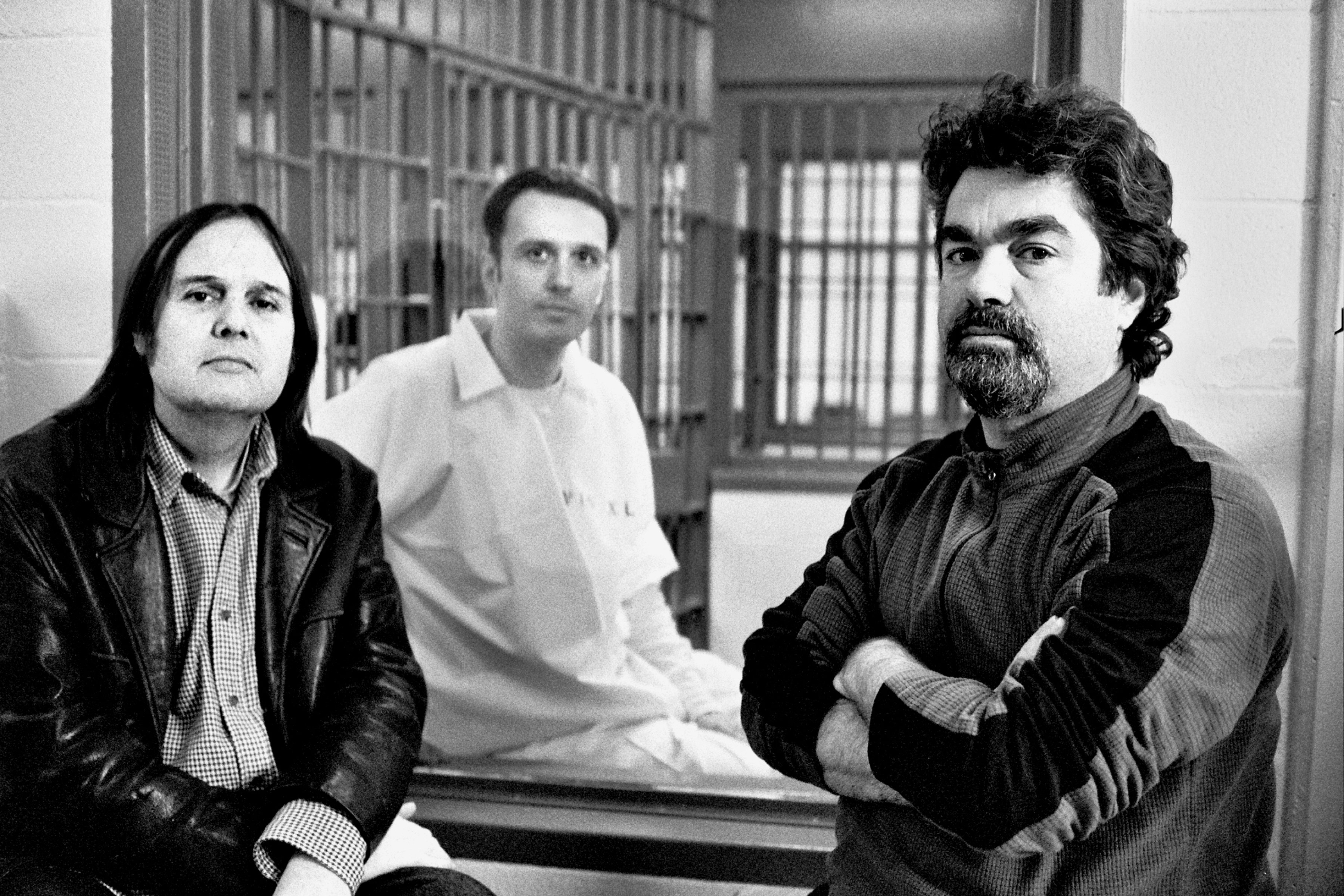 Filmmakers Joe Berlinger (right) and Bruce Sinofsky (left) with West Memphis Three member Damien Echols on death row in 2009 during the filming of Paradise Lost 3: Purgatory.