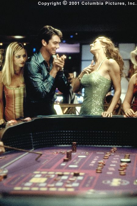 Even though a sexy Vegas redhead (Amber Smith) rubs Michael's (Jerry O'Connell) dice for good luck, he still drums up a $51,000 casino debt