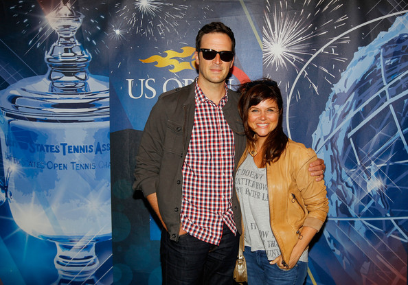 Tiffani Thiessen and Brady Smith attending Day Eleven of the 2013 US Open at the USTA Billie Jean King National Tennis Center on September 5, 2013 in New York City.