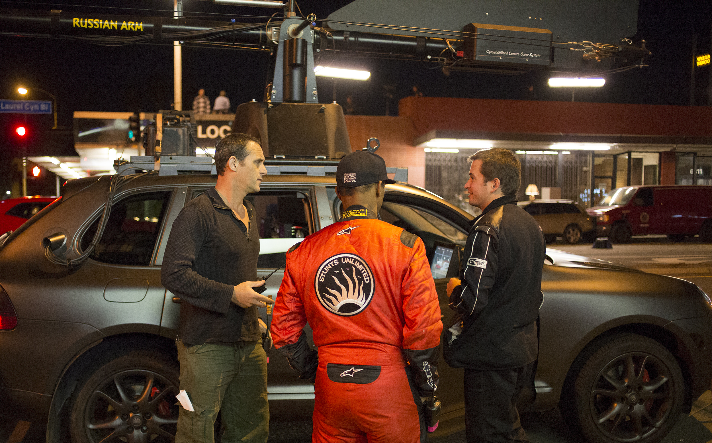 Mike Smith (2nd Unit Director/Stunt Coordinator) Going over the nights action with veteran stuntmen Jay Lynch and Logan Holiday.