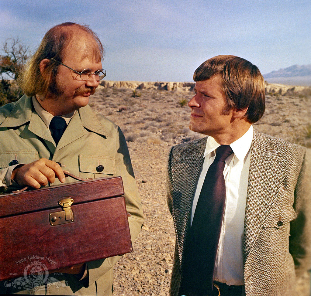 Still of Bruce Glover and Putter Smith in Deimantai amziams (1971)
