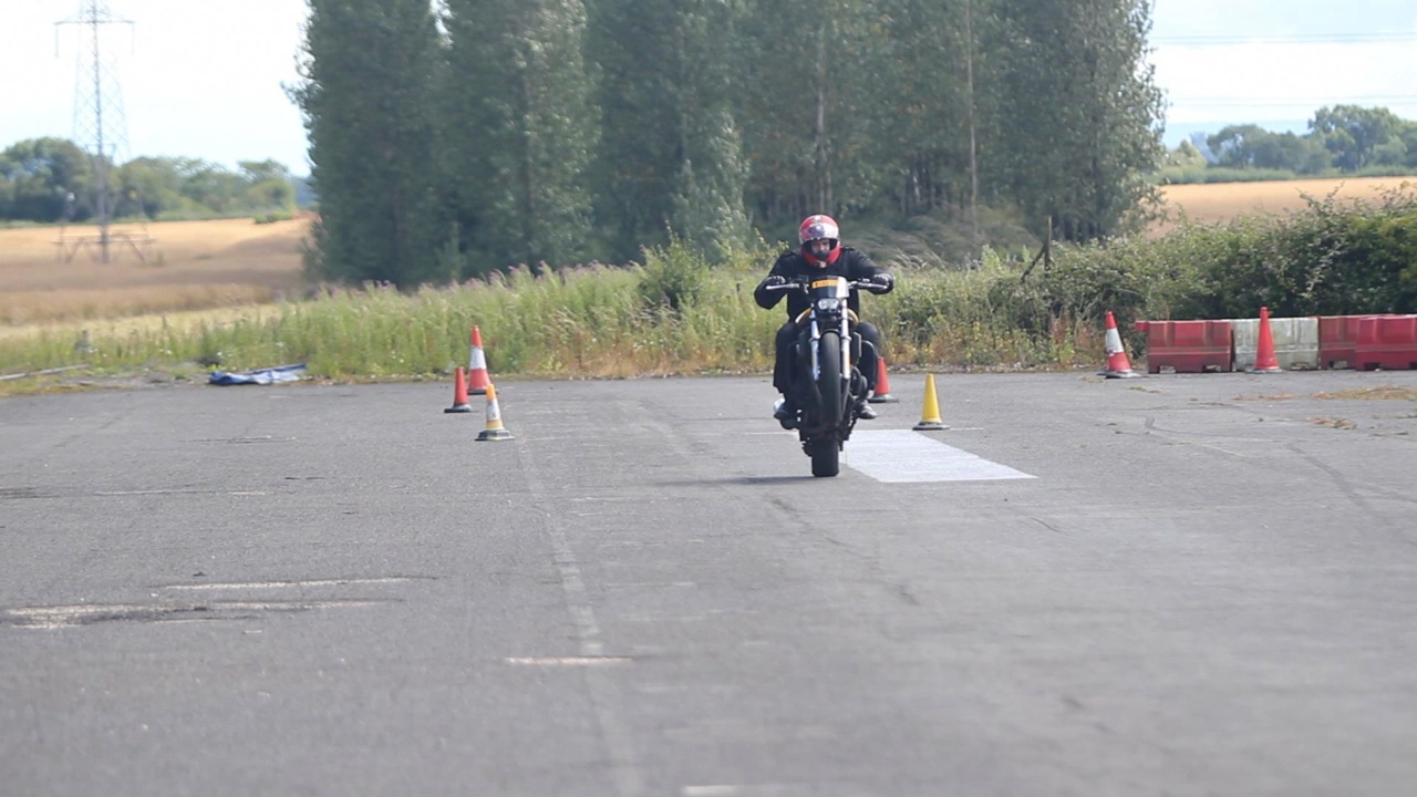 Ryan J-W Smith pops a wheelie on a Fazer600