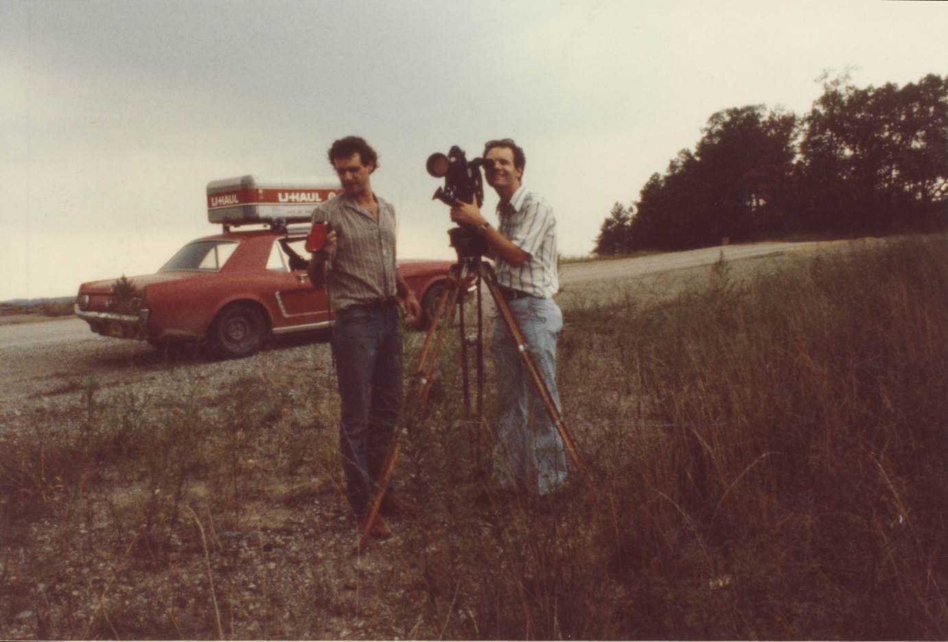 Director Ross Spears (behind camera) and cinematographer Anthony Forma during the filming of The Electric Valley in East Tennessee in 1982. Red Mustang in bg.