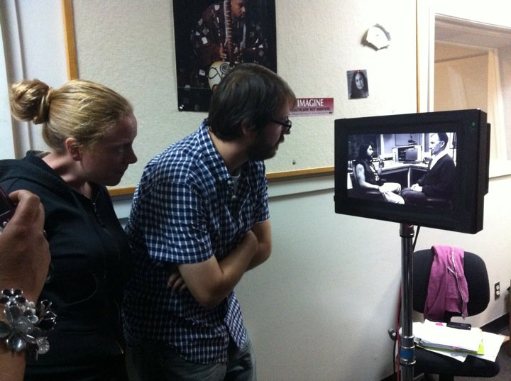 Susan Metzger and Wasko Khouri looking on as Ed Refuerzo and Sean Spence prepare to shoot a scene for 