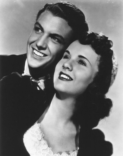 Deanna Durbin and Robert Stack in First Love (1939)